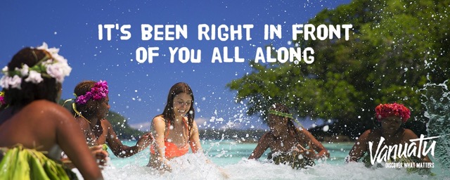 People splashing on Vanuatu beach